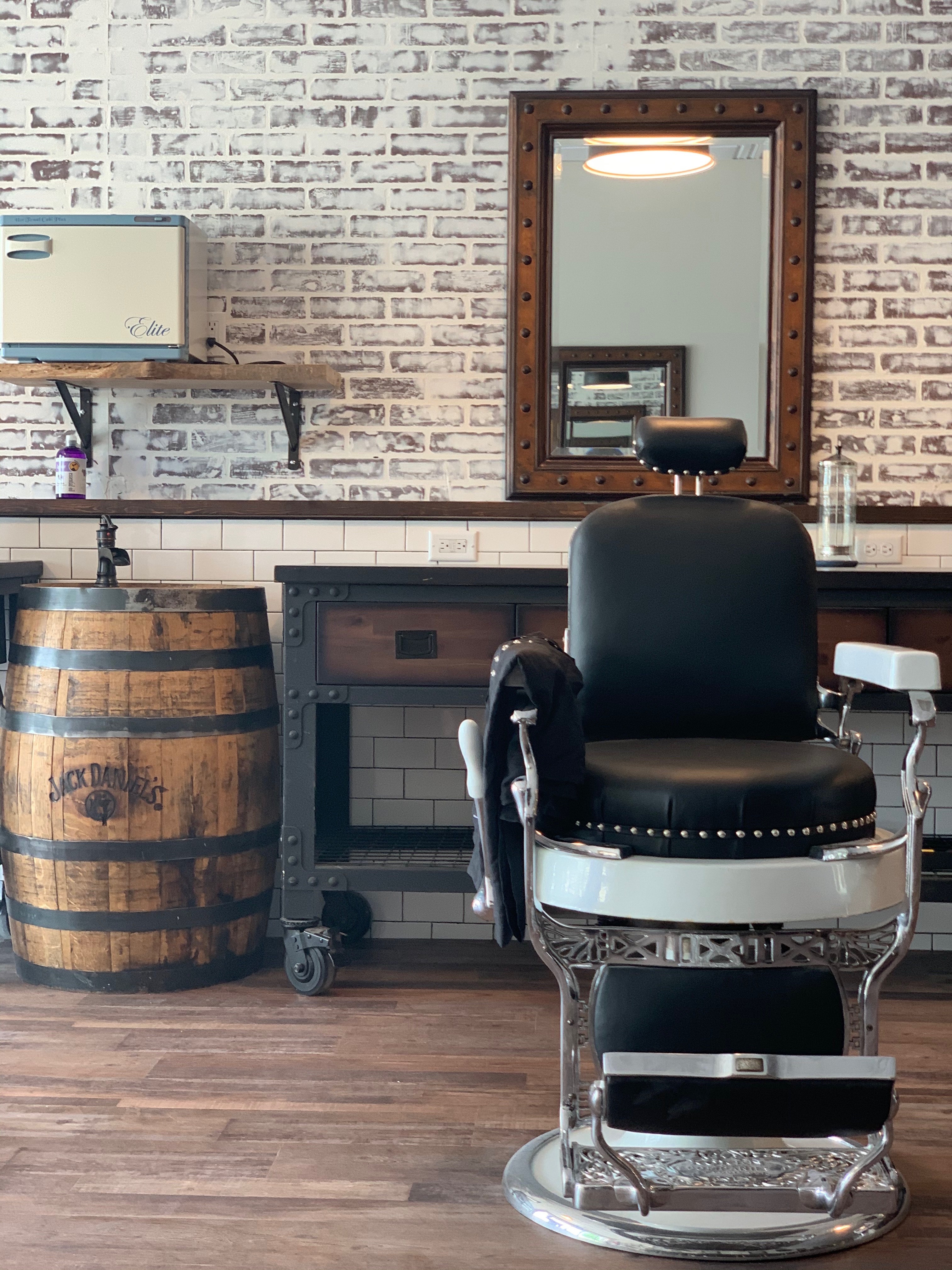 Barber chair in the Barrel & Blade shop interior